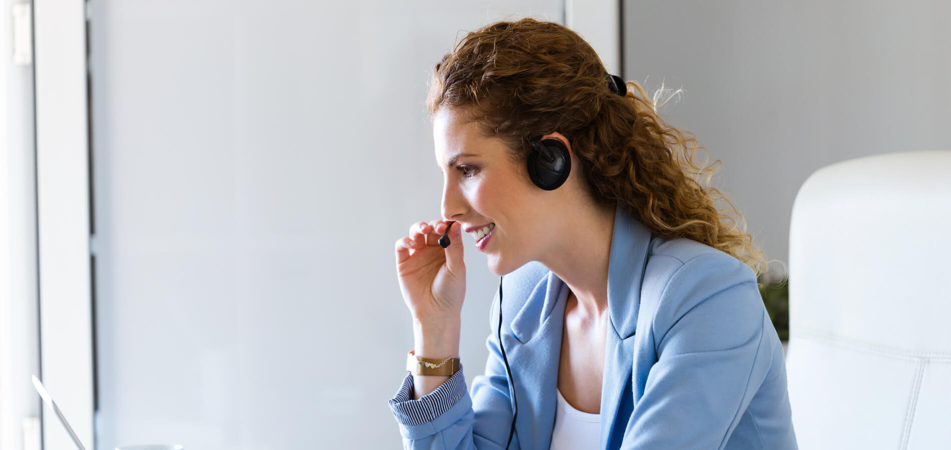 customer-service-operator-talking-on-phone-in-the-office-1-1